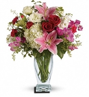 Kensington Garden Bouquet with white hydrangeas, pink oriental lilies, red roses, and pink spring blooms in a clear glass vase
Elegant flower arrangement with hydrangeas, lilies, roses, and seasonal pink flowers, all-around design. Kensington Garden Bouquet with white hydrangeas, pink oriental lilies, red roses, and pink spring blooms in a clear glass vase
Elegant flower arrangement with hydrangeas, lilies, roses, and seasonal pink flowers, all-around design.